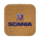 A square cork wireless charger with a logo printed in blue and red, featuring a lion design and the word "SCANIA".