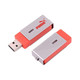 A flash drive with a silver and orange design, featuring a logo, showcasing its swivel feature.