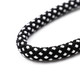 A black and white braided strap with a textured finish, designed for crossbody use with phones.