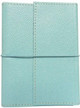 A turquoise notebook with a textured cover and elastic closure, featuring a removable inner notebook.