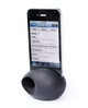 A black acoustic sound amplifier for phones, featuring a smartphone dock positioned in a curved holder.
