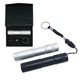 A silver and black metal torch with a carry strap and split ring, packed in a black gift box.