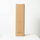 A drink bottle in a cardboard package, featuring a sleek design. The bottle is labelled as 500ml.