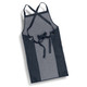 A denim bib apron featuring shades of dark blue and grey, with a waist tie and crossed back straps.