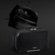 A black Swiss Peak toiletry bag featuring multiple compartments and a hook for hanging. It has a logo on the front.