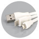 A round bamboo charging cable key ring in white, featuring USB, USB-C, and Lightning connectors.