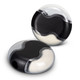 A black and clear pencil sharpener with an eraser, featuring a rounded design and a logo on the surface.