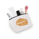 A canvas cosmetic bag in white, containing various beauty products like creams, spray bottles, and a makeup brush.