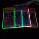 Four waterproof phone bags in vibrant colours, featuring fluorescent outlines and interlocking closures, each holding a phone.