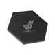 A hexagonal slate coaster in charcoal black with a logo printed on the surface.