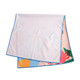 A microfibre beach towel featuring colourful prints, folded over with blue edging.