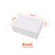 A small white foldable magnetic box with dimensions marked. It features a ribbon and has a logo.