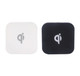 Square-shaped wireless chargers in black and white, featuring a logo on the surface.