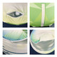 An inflatable ottoman in green and white with a drink bottle pocket and zipper detail. It has a logo or branding.