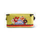 A yellow cooler bag with a vibrant design featuring food items, stripes, and a logo on the front.