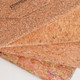 Foldable cork glasses case in natural cork with a textured finish, featuring colourful abstract patterns on one side.