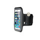 A black cell phone arm band with a transparent front pocket for a mobile device and a small key holder on the side.