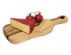 A small wooden serving board with a wedge of cheese, two tomatoes, and crackers. The board features a natural wood grain.