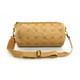 A tan kraft paper duffle bag with a logo, featuring a detachable shoulder strap and a cylindrical shape.