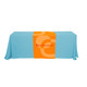 A large table runner in orange and blue, featuring a logo on the centre section.