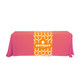 A large table runner in vibrant pink with an abstract orange and white design, featuring a logo at the centre.