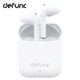 A pair of white defunc True Go Slim Earbuds in a charging case, featuring a logo on the case.