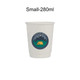 A white disposable paper cup with a printed camping design featuring mountains and a tent.