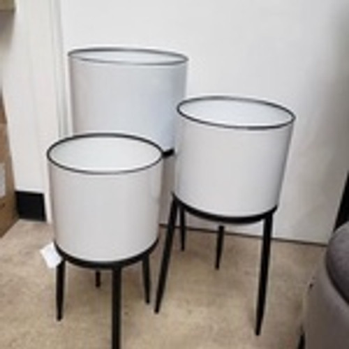 White metal planter with Legs