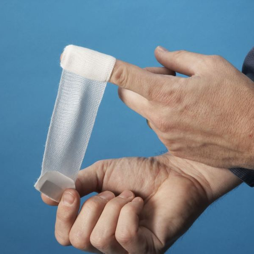 Finger dressing with adhesive trip enabing easy self-application