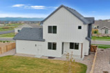 Farmhouse House Plan - Bridgeport 89125 - Rear Exterior