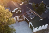 Craftsman Style Home Plan - Aerial View of Front Exterior and Roof - Front Exterior