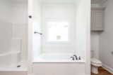Ranch House Plan - Taylor 48440 - Master Bathroom
