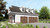 Farmhouse House Plan - Mark Harbor B 93114 - Left Exterior