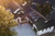 Craftsman Style Home Plan - Aerial View of Front Exterior and Roof - Front Exterior