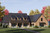 Modern Farmhouse Plan - Front Left Exterior - 