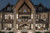 Mountain Rustic House Plan - 54805 Skyline View - Rear Exterior at Night - 