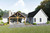 Farmhouse House Plan - Windward Farmhouse 56993 - Rear Exterior