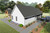 Farmhouse House Plan - Windward Farmhouse 56993 - Left Exterior