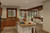 Farmhouse House Plan - Double Retreat 51409 - Kitchen