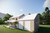 Farmhouse House Plan - Zoe 18467 - Rear Exterior