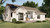 Farmhouse House Plan - Maple Grove 61609 - Rear Exterior