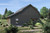 Farmhouse House Plan - Bentonville 74020 - Rear Exterior