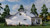 Farmhouse House Plan - Rustic Gables 32884 - Left Exterior