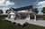 Farmhouse House Plan - Cedarline Ridge 16994 - Rear Exterior