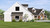 Farmhouse House Plan - 20672 - Left Exterior