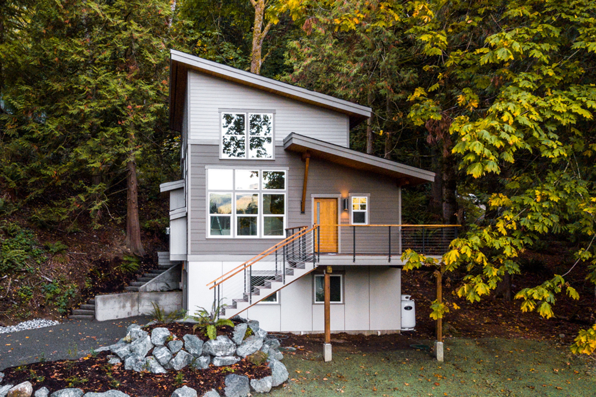 Inside a Tiny House With a Pop-Out Deck - Alpha Tiny Home by New Frontier Tiny  Homes