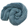 A medium dusty blue tonal colorway with gray undertones hand-dyed by Wonderland Yarns on a variety of yarn bases. Made in the USA.