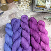 5 Million Kisses is a color morph collection of five mini skeins that transition gradually from a magenta to blue with purple undertones.