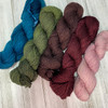 Cabin Fever is a limited edition colorway mini skein set from Wonderland Yarns inspired by our Birds & Beasts 8-pack!