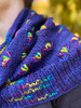 Designed to highlight the Wonderland Yarns Colorburst dye technique, the  big and squishy Scattered Flowers Cowl pattern has you working a Dandelion Stitch at each burst of color. It's coziness and length allow you to style it in a variety or ways. Colorbursts are hand-dyed in Vermont USA.